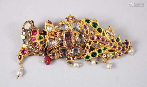 AN 18TH-19TH CENTURY PERSIAN TURBAN CLIP / BROOCH set with diamonds, rubies and emeralds.