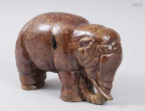 A JAPANESE MEIJI PERIOD STUDIO POTTERY ELEPHANT MONEY BOX, 14cm high x 23cm long.