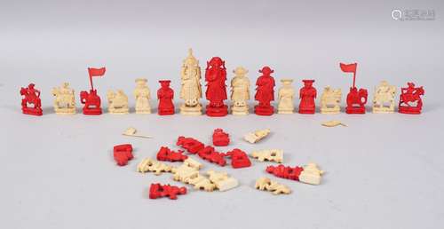 A 19TH CENTURY CHINESE CARVED & STAINED IVORY CHESS SET, consisting of 32 pcs.