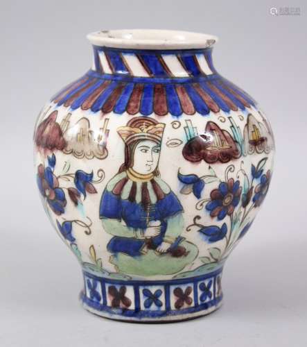 A 19TH CENTURY PERSIAN QAJAR GLAZED POTTERY VASE, the sides with portraits, 20cm high.