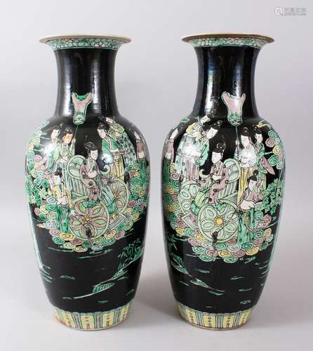 A GOOD PAIR OF 19TH CENTURY CHINESE FAMILLE NOIR PORCELAIN VASES, the body of each vase with