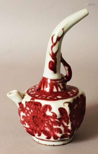 AN UNUSUAL CHINESE MING STYLE COPPER-RED COMBINED WATER DROPPER & EWER, the hollow handle forming