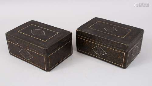 A PAIR OF 19TH CENTURY PERSIAN QAJAR SIGNED LACQUER PAPIER MACHE BOXES AND COVERS, 16cm long x