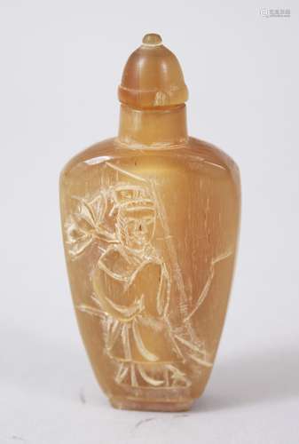 A 19TH CENTURY CHINESE RHINOCEROS HORN SNUFF BOTTLE, the front carved in relief to depict a figure