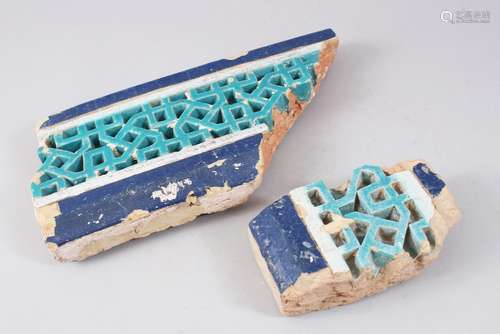 TWO 15TH CENTURY CENTRAL ASIAN TIMURID GLAZED POTTERY TILE FRAGMENTS, 16cm x 9cm and 32cm x 17cm.