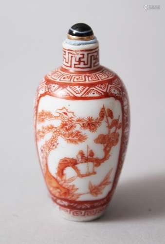 AN 18TH CENTURY CHINESE IRON RED PORCELAIN SNUFF BOTTLE, decorated in iron red to depict two