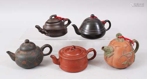 A MIXED LOT OF FIVE 19TH / 20TH CENTURY CHINESE YIXING CLAY TEA POTS, consisting of five clay Yixing