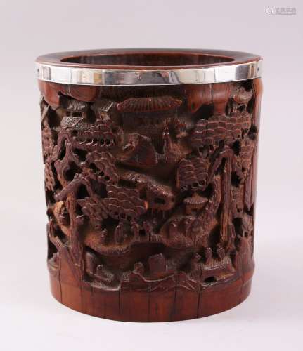 A GOOD 19TH CENTURY CHINESE CANTON SILVER RIM BRUSH POT, carved in deep relief to depict scenes of