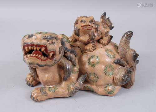 A 18TH / 19TH CENTURY OR EARLIE JAPANESE POTTERY FIGURE / KORO OF A SHI SHI DOG , with a light peach