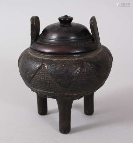 A GOOD 19TH CENTURY OR EARLIER CHINESE BRONZE TRIPOD CENSER, the body with geometric design, the