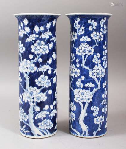 A PAIR OF 19TH CENTURY CHINESE BLUE & WHITE PORCELAIN PRUNUS FLUTED VASES, the vases decorated