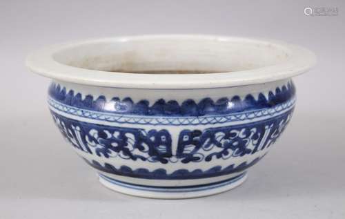 A 19TH CENTURY CHINESE BLUE & WHITE PORCELAIN JARDINIERE,decorated with formal scrolling foliage,