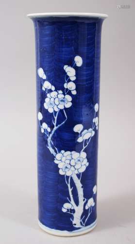 A 19TH CENTURY BLUE AND WHITE PORCELAIN PRUNUS SPILL VASE, the base with double blue rings, 29.5cm