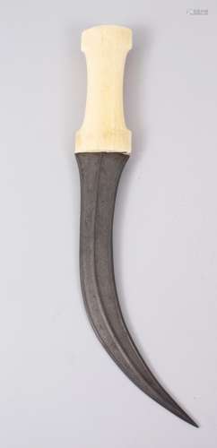 A 19TH CENTURY PERSIAN DAGGER with walrus handle and watered steel blade, 35cm long.
