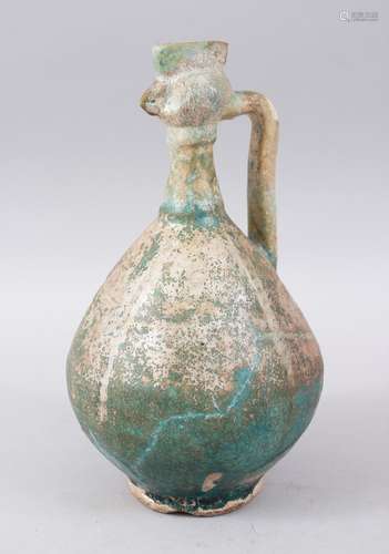 A RARE 12TH-13TH CENTURY PERSIAN TURQUOISE GLAZED EWER with cockerel spout, 28cm high.