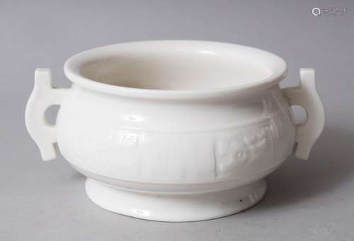 A 20TH CENTURY CHINESE BLANC DE CHINE TWIN HANDLE CENSER, with various moulded panel decoration, the