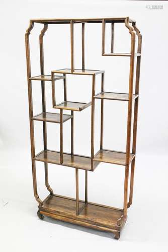 A GOOD CHINESE 19TH / 20TH CENTURY HARDWOOD FLOOR STANDING MULTI TIER SHELVING UNIT, enclosing