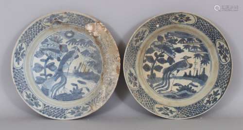 A PAIR OF CHINESE WANLI PERIOD BLUE & WHITE SHIPWRECK PORCELAIN PEACOCK DISHES. approx. 26.6cm (2)