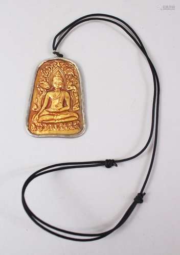 A GOOD THAI GOLD PENDANT OF A BUDDHA, the pendant impressed gold with a silver surround, the pendant