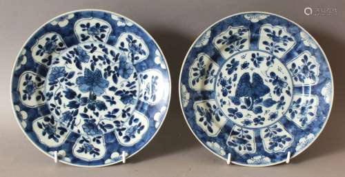 A PAIR OF CHINESE KANGXI PERIOD BLUE & WHITE SHIPWRECK PORCELAIN PLATES, circa 1700, each base