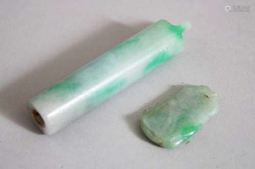 TWO GOOD CHINESE JADEITE PENTDANTS, one of cylindrical form, the other of carved fruit upon