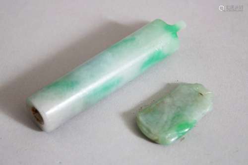 TWO GOOD CHINESE JADEITE PENTDANTS, one of cylindrical form, the other of carved fruit upon