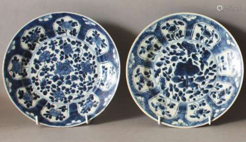 A PAIR OF CHINESE KANGXI PERIOD BLUE & WHITE SHIPWRECK PORCELAIN PLATES, approx 21cm diameter each.
