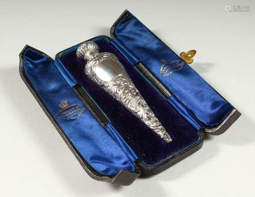 A VERY GOOD VICTORIAN SILVER TAPERING SCENT BOTTLE with plain glass stopper, the case repousse