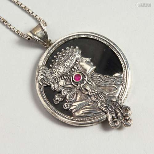 A SILVER RUBY SET ALPHONSE MUCHA LADY PENDANT AND CHAIN.