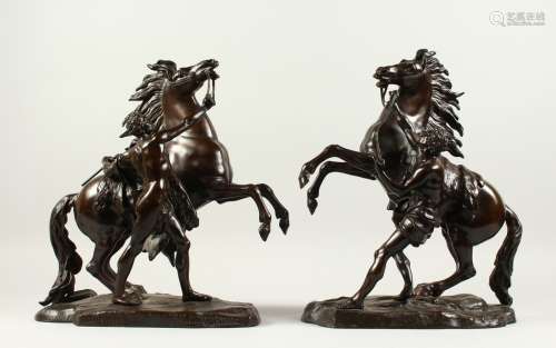 AFTER GUILLAUME COUSTOU (1677-1746) A PAIR OF MARLEY HORSES WITH ATTENDANTS, each on a