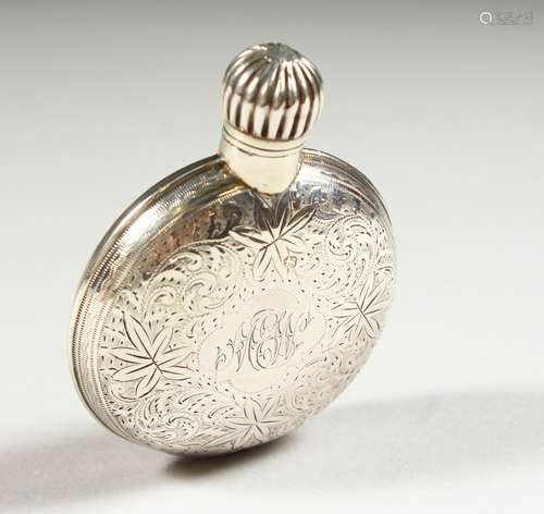 A VICTORIAN ENGRAVED SILVER CIRCULAR SCENT BOTTLE with screw off top, with initial W. Sheffield