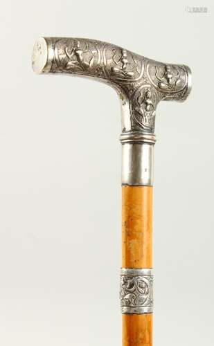 A WALKING STICK with Burmese silver handle. London 1908. 2ft long.