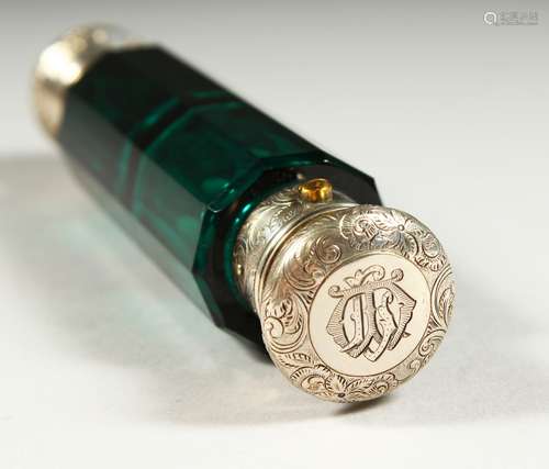 A GOOD VICTORIAN GREEN GLASS DOUBLE ENDED SCENT BOTTLE with engraved silver tops. Initialled. 13.