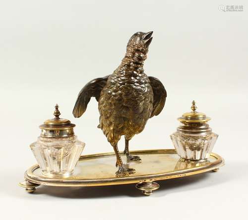 A SUPERB AUSTRIAN INKSTAND, with a painted cold cast bird, on an oval base with two cut glass