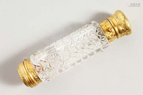 A VICTORIAN HOBNAIL CUT DOUBLE ENDED SCENT BOTTLE with lift off cap, the other end with vinaigrette.