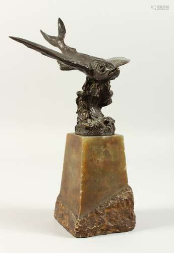 A SUPERB BRONZE OF A FLYING FISH, on a carved marble plinth. 30cms high overall.