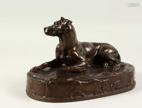 OUDIN, A SMALL FRENCH BRONZE OF A RECLINING DOG, STAMPED OUDIN, F. BARBEDIENNE FONDEUR, on an oval