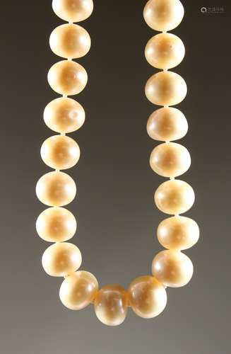 A PEARL SINGLE ROW NECKLACE with 14k GOLD CLASP.