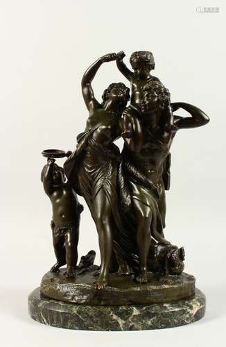 AFTER CLODION, A CLASSICAL BRONZE GROUP of a male and female figure with two young children, on a