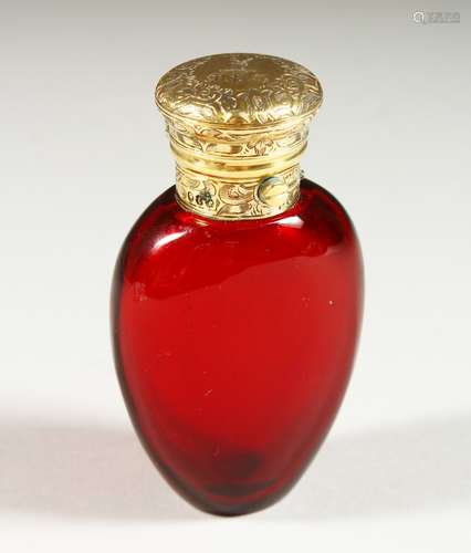 A GOOD VICTORIAN RUBY GLASS SCENT BOTTLE with engraved silver gilt top with stag crest and M.P.G.