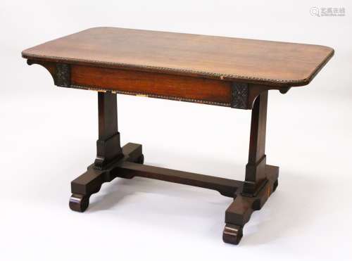 A 19TH CENTURY ROSEWOOD LIBRARY TABLE with beaded rounded rectangular top, a frieze drawer, on plain