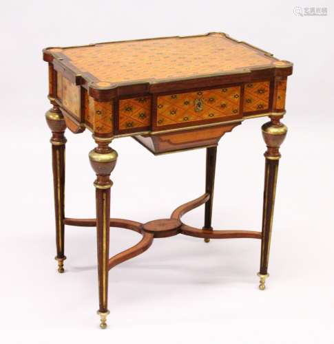 A GOOD 19TH CENTURY FRENCH PARQUETRY AND ORMOLU WORK TABLE, the rising top inlaid with a stylized
