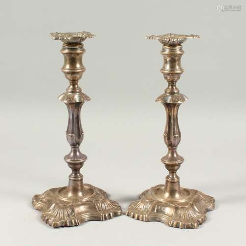 A LARGE PAIR OF SILVER CANDLESTICKS. London 1907. maker Hutton's. 12ins high.