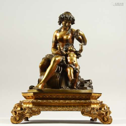 A SUPERB FRENCH BRONZE GROUP OF A SEMI-NAKED WOMAN feeding a child grapes on a stand with a barrel