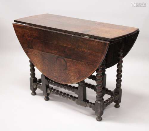 AN 18TH CENTURY OAK OVAL DROP FLAP DINING TABLE with bobbin turned gate leg action. 4ft 5ins