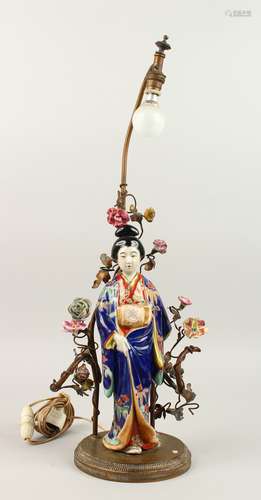 A FRENCH TABLE LAMP, as a Japanese porcelain Geisha, with metal branches and flower head. 34cms