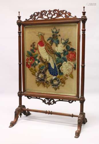 A VICTORIAN MAHOGANY FRAMED FIRESCREEN, with beadwork and woolwork panel depicting a bird on a