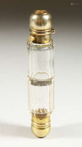 A VICTORIAN GLASS DOUBLE ENDED SCENT BOTTLE with plated tops. 13cms long.