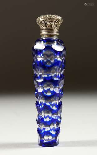 A GOOD VICTORIAN BLUE TINTED GLASS TAPERING SCENT BOTTLE with repousse silver cap and frosted