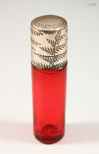 A VICTORIAN PLAIN RUBY GLASS SCENT BOTTLE AND STOPPER with engraved silver cap. 7cms long x 1.5cms